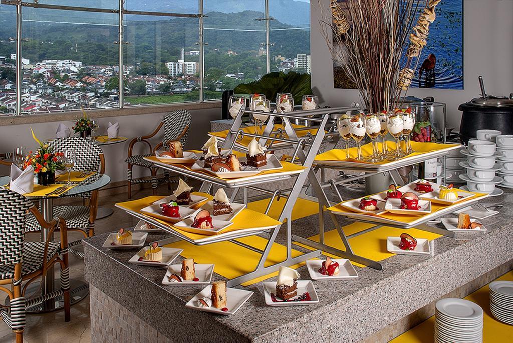 Ghl Hotel Grand Villavicencio Ngoại thất bức ảnh A dessert buffet