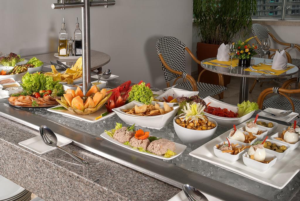 Ghl Hotel Grand Villavicencio Ngoại thất bức ảnh A buffet